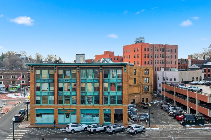 Thayer Apartments side view with parking